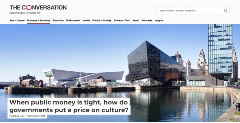 Screenshot of an online article featuring a photograph of museums and a dock